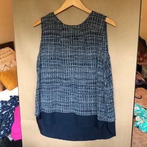 sleeveless navy blue and white blouse